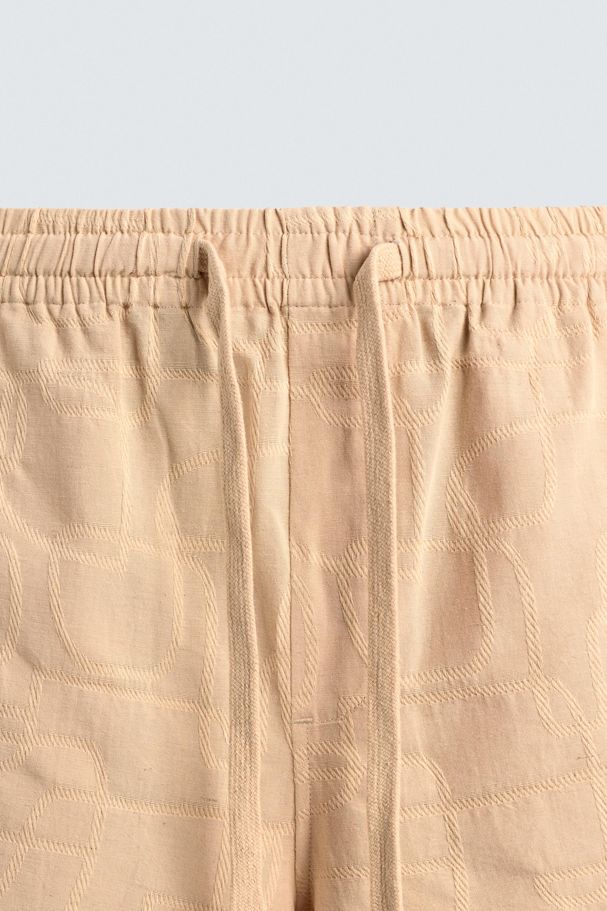 SHORT RELAXED FIT JACQUARD BRODÉ